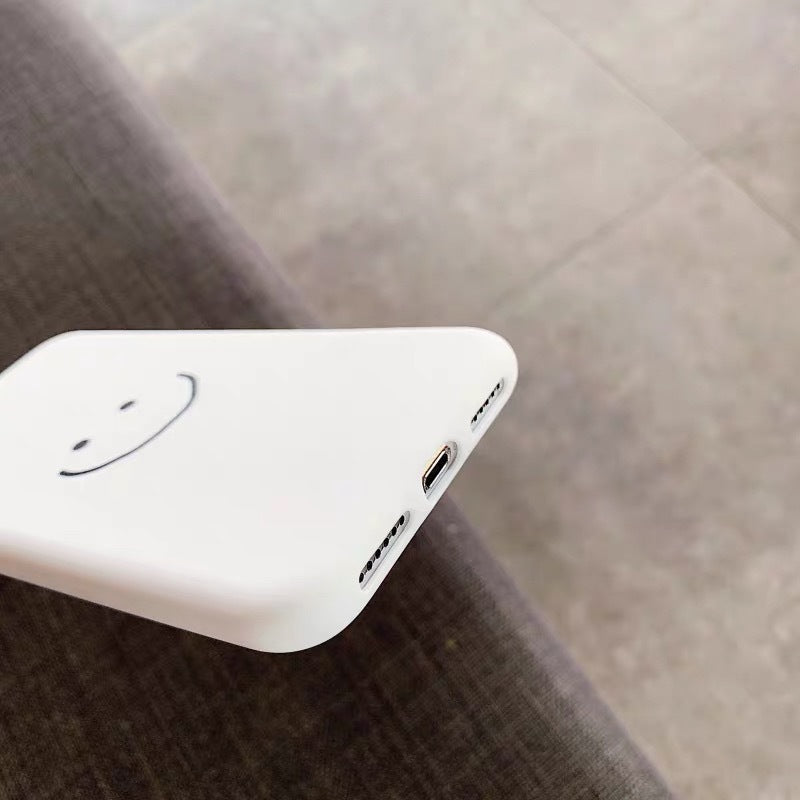 Mobile phone case with simple personality and smiling face