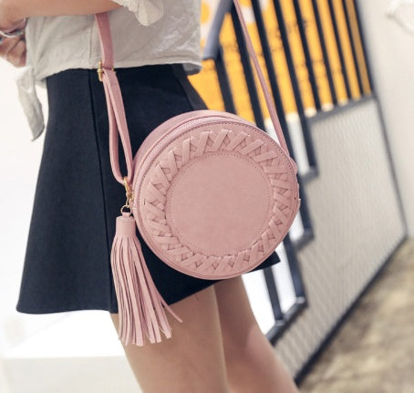 New Korean version of the trend tassels small round bag fashion creative shoulder diagonal cross-bun packet small bag trend handbags