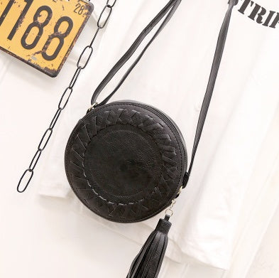 New Korean version of the trend tassels small round bag fashion creative shoulder diagonal cross-bun packet small bag trend handbags